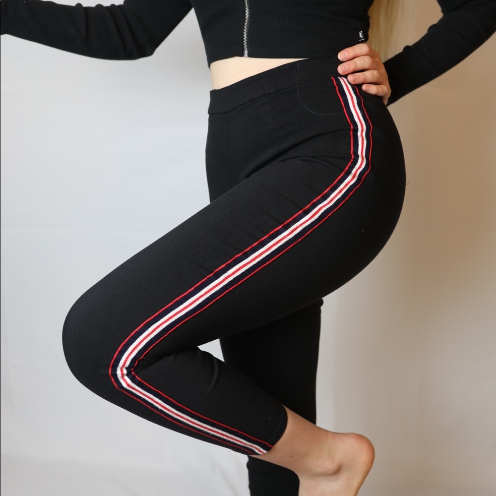 Urban Outfitters red and white striped black pants